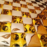 Gold Light Silhouette – Black Dot